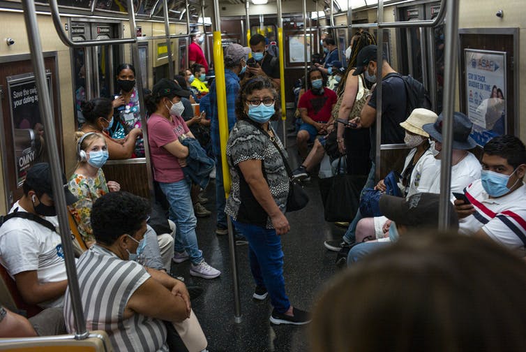 Masked riders on the subway