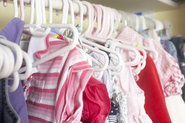 Girl's clothing hanging in a closet