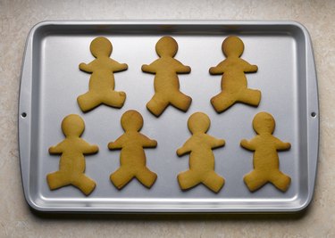 Gingerbread men on baking sheet