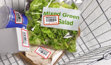 Money off shopping in supermarket basket