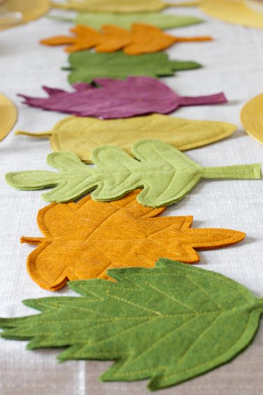 This colorful DIY felt fall leaves table runner is easy to make, will brighten up your fall table and make all your meals feel special.