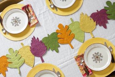 This colorful DIY felt fall leaves table runner is easy to make, will brighten up your fall table and make all your meals feel special.