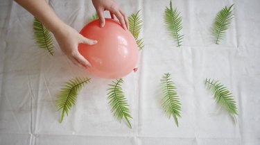 gluing balloon to center of table