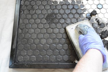 grout the tile