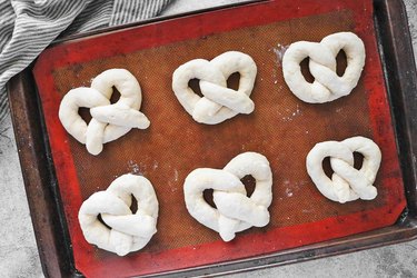 Form remaining dough into pretezls