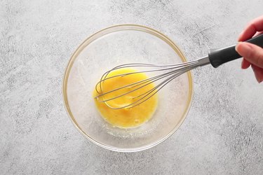 Whisk egg yolks