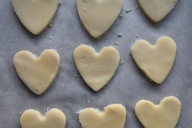 Cut heart shapes out of the cookie dough.