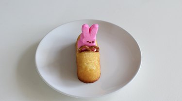 Pretzel steering wheel inserted in front of bunny