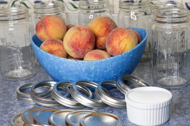 Even though fresh peaches are only available for a few months in the summer, there's no reason you can't enjoy them all year long. Just choose some fresh ripe peaches, grab a few jars, a little sugar, and you'll be on your way to preserving these delightful beauties in no time.