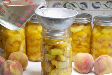 Even though fresh peaches are only available for a few months in the summer, there's no reason you can't enjoy them all year long. Just choose some fresh ripe peaches, grab a few jars, a little sugar, and you'll be on your way to preserving these delightful beauties in no time.