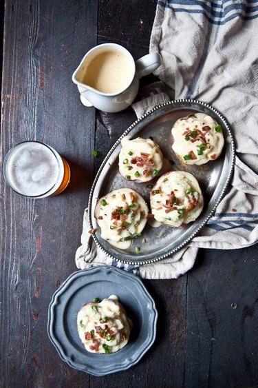 Twice-baked potatoes and cheese sauce.