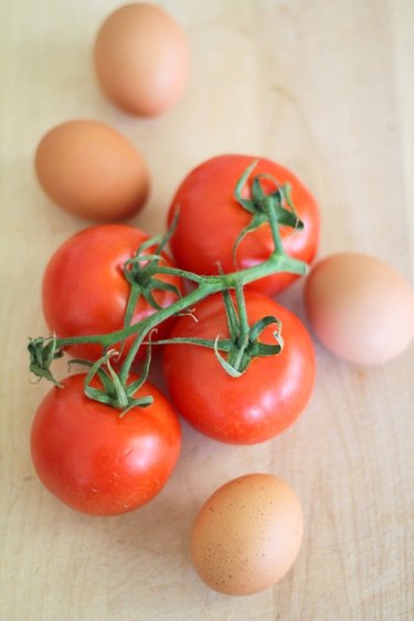 Fresh tomatoes and whole eggs.