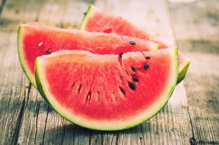 Watermelon slices on the wooden table