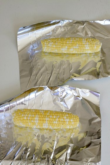 corn on the cob on foil