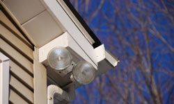 Bright, motion-controlled lights are a popular way to add some security to your home.